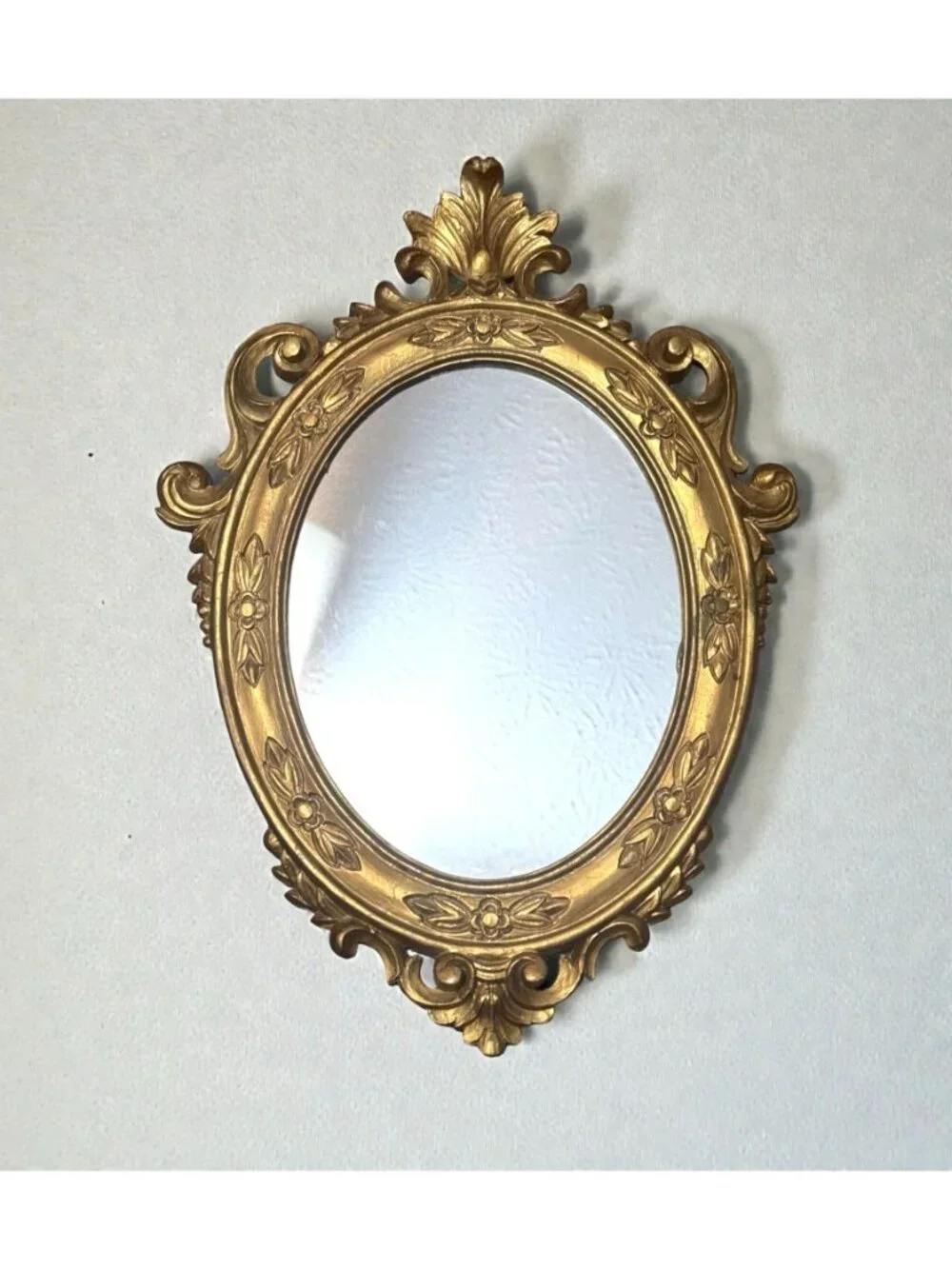 Ornate Gold Oval Mirror With Floral Details & Vintage Frame Design